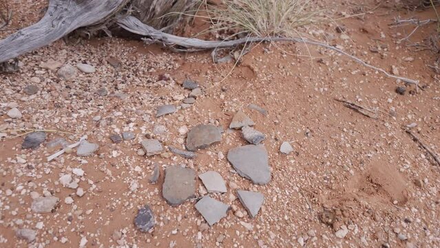 Shards of Native American pottery in the Escalante desert in the sand in Utah.