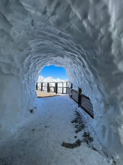 Haute-Savoie, France, 04-25-2024: ice tunnel on the top of L’Aiguille du Midi (Needle at midday),...