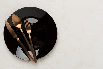 Minimal table setting on concrete background, top view