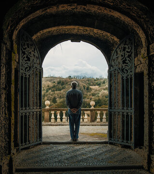 silhouette of a person in a doorway collodi park, italy