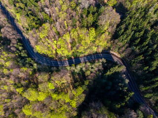 Drone aerial view - windy road in springtime
