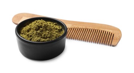 Henna powder in bowl and comb isolated on white