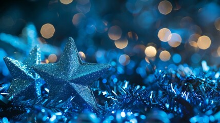 Sparkling blue stars amidst festive tinsel background