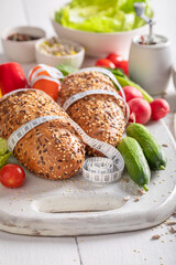 Homemade ingredients for sandwich with lettuce, peppers and tomato.