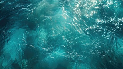 Blue water surface with sunbeams close-up. Abstract background