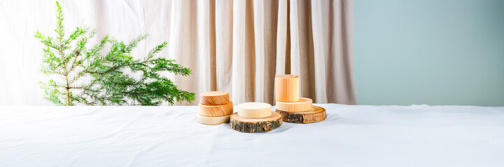 wooden podium on white and linen background