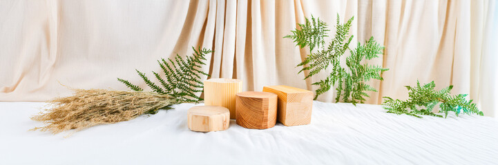 wooden podium on a natural background with plants