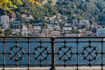  View of the mountainous coast of Lake Como, Italy, picturesque buildings on the lake, no people.