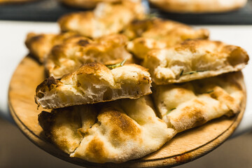 impala pizza cutten pieces on the wooden board, closeup shot. High quality photo