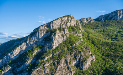 Sicevo Gorge (Sicevacka klisura) in Serbia.  The gorge in the middle of mountains. A view of the huge rocks that rise above the gorge.