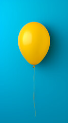 Yellow balloons floating in the blue sky