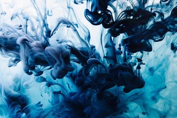 mesmerizing mix of classic blue and black inks swirling in water abstract photography