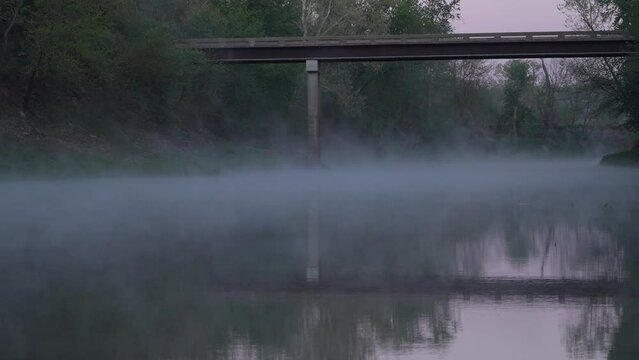 springtime morning fog over calm water - Lamine River at Roberts Bluff, Missouri