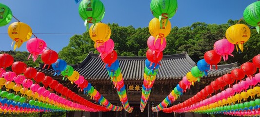 hanging paper lanterns in temple for Buddha's birthday