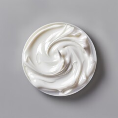 smooth creamy white face cream on a light gray background texture, top view, close-up