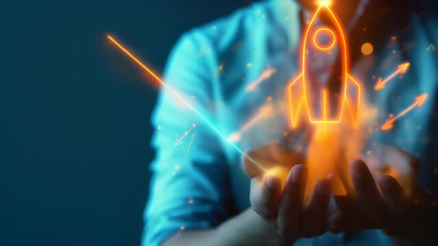 Hands cradle glowing rocket icon with upward arrows, embodying a startup's rapid growth, ambitious vision, and innovative spirit. Symbolic image captures the potential for exponential success.
