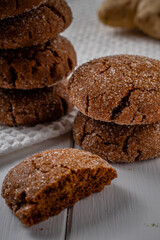 Warm Homemade Gingersnap Cookies on a wooden white board