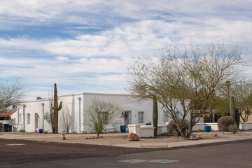 Exterior view from the street of a house on a corner in the Sam Hughes district of Tuscon, Arizona