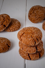 Warm Homemade Gingersnap Cookies on a wooden board