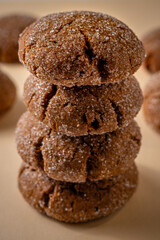 Warm Homemade Gingersnap Cookies on a beige background