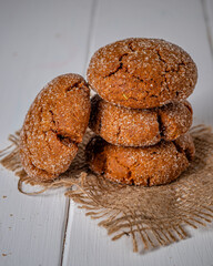 Warm Homemade Gingersnap Cookies on a wooden board