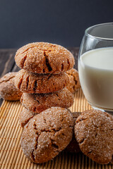 Warm Homemade Gingersnap Cookies gray towel and milk
