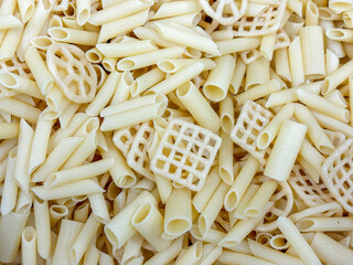 A pile of pasta with different shapes and sizes