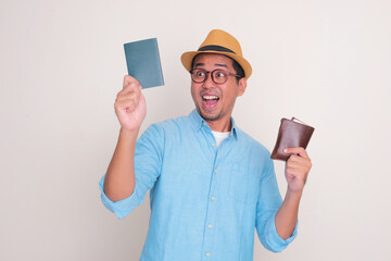 A man showing wow face expression while holding wallet and passport document