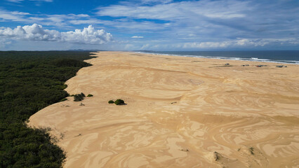 Walk through the sand dunes to Tin City
