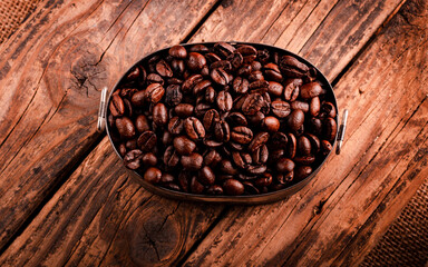 coffee beans on wooden background, top view