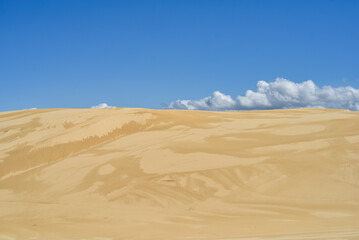walk across the dunes to Tin City