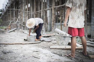 child labor concept. Children working at construction site, Poor children, poverty.