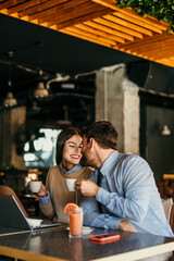Multiracial business team having a meeting in a coffee shop