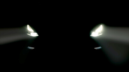 Turned on headlights of a modern, sports car on a black background. Concept of automobile services,...