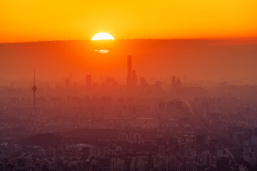 Sunrise of Beijing City with thick clouds