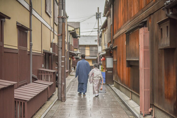 Rainy Day Walking Trip With Japanese Traditional Kimono On The Old Town Kyoto During Sakura Season, Higashiyama District, Kyoto, Japan