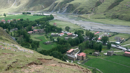 a tibetan village in the mountains in western sichuan, china