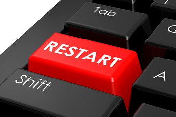 Red restart button on the black keyboard