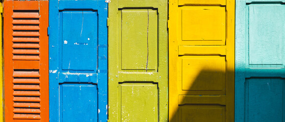 Colorful wooden English Doors. Collection of doors
