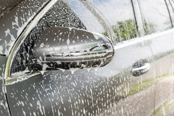 car cleaning and washing with foam soap