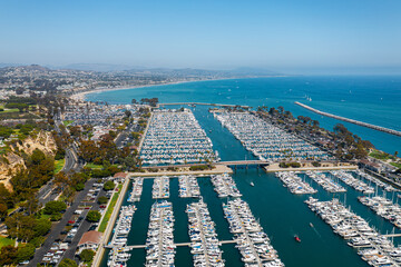 Aerial View of Dana Point Harbor With Boats and Jetty