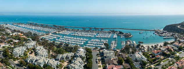 Aerial Panoramic View of Dana Point Harbor with Boats and Coastal Homes