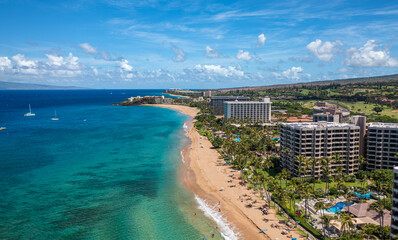 Aerial View of Maui Coastline with Sandy Beach and Resorts