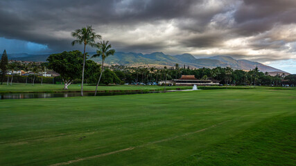 Scenic View of Maui Golf Course with Dramatic Clouds