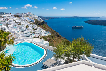 White architecture in Santorini island, Greece. Luxury swimming pool with sea view
