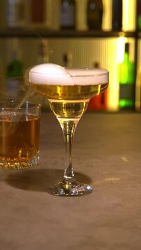 Smoked margarita preparation - adding smoked bubble