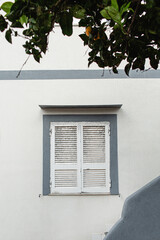 Italy. An old wooden window with shutters. Traditional European architecture. Vacation travel