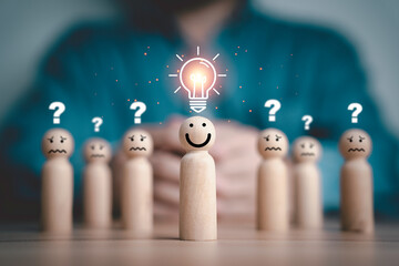 Smile figure with glowing lightbulb in front of sad figure with question mark for Creative thinking idea and problem solving concept.