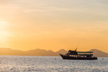 Beautiful sunrise over the sea at Koh Kradan in Trang, Thailand. Good morning a good day.