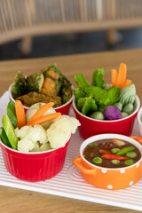 Thai Shrimp Paste Dipping Sauce with Vegetables: A delectable assortment of fresh vegetables, including cauliflower, green peppers, and carrots.